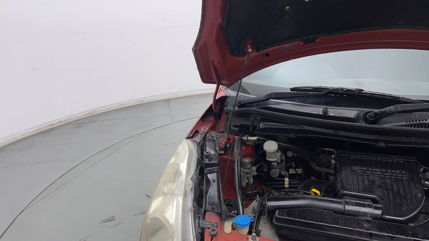 Used 2013 Maruti Suzuki Swift VXi Petrol Manual engine ENGINE RIGHT SIDE HINGE & APRON VIEW