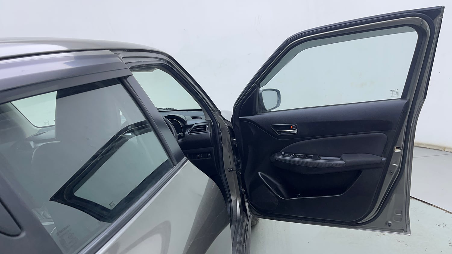 Used 2021 Maruti Suzuki Swift VXi Petrol Manual interior RIGHT FRONT DOOR OPEN VIEW