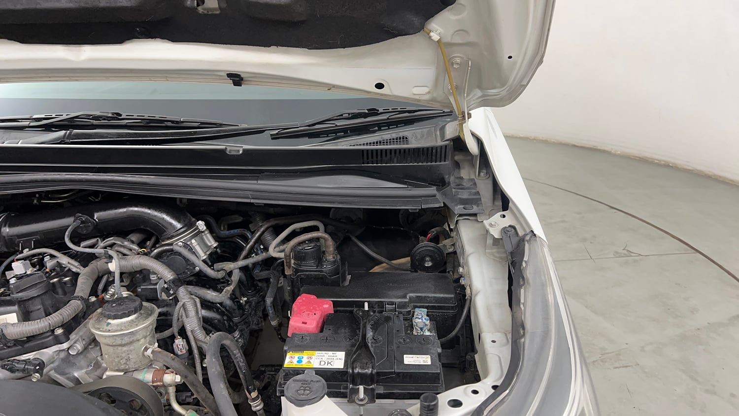 Used 2023 Toyota Innova Crysta ZX 2.7 AT 7 STR Petrol Automatic engine ENGINE LEFT SIDE HINGE & APRON VIEW