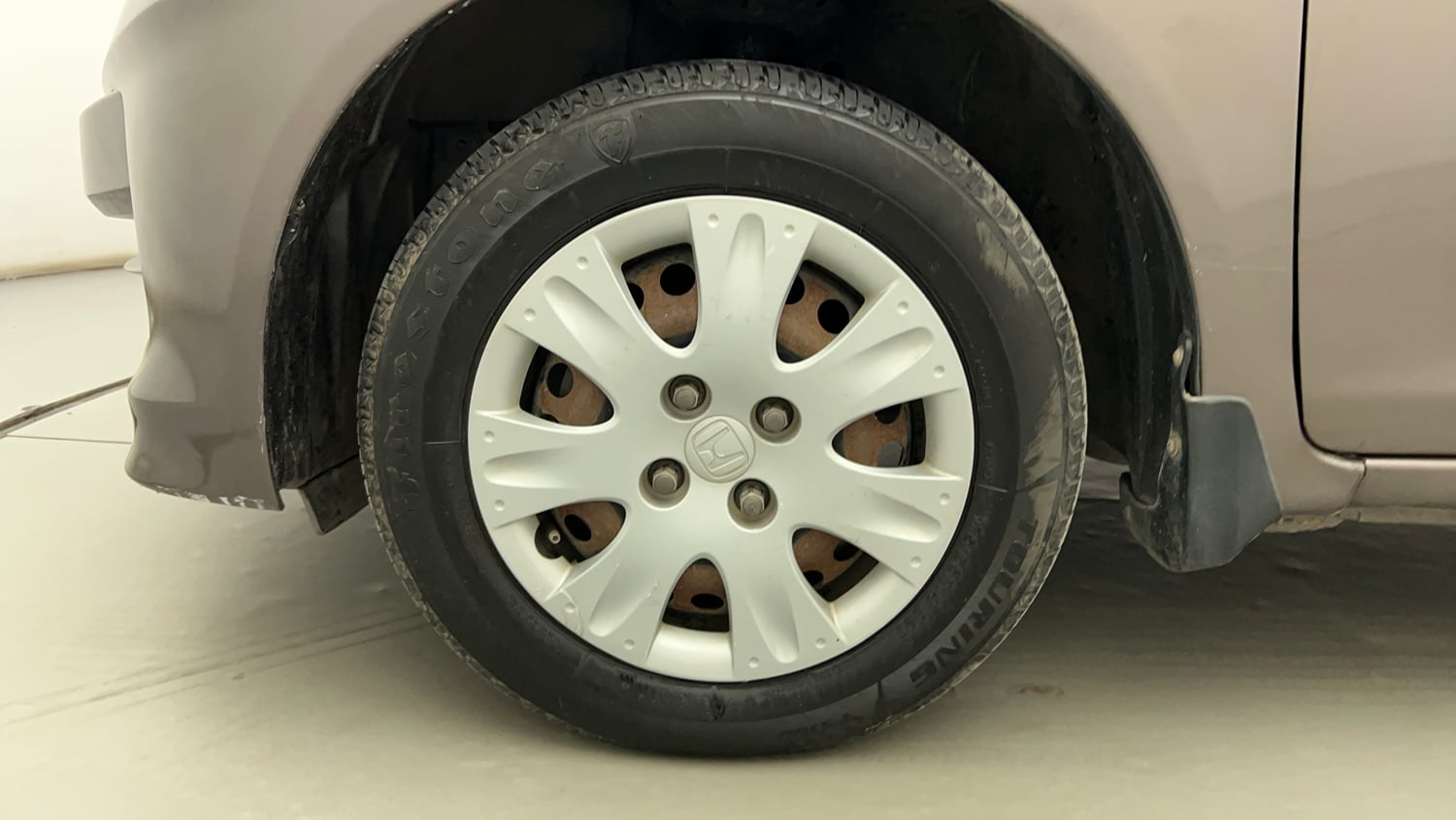 Used 2013 Honda Amaze 1.2 S i-VTEC Petrol Manual tyres LEFT FRONT TYRE RIM VIEW