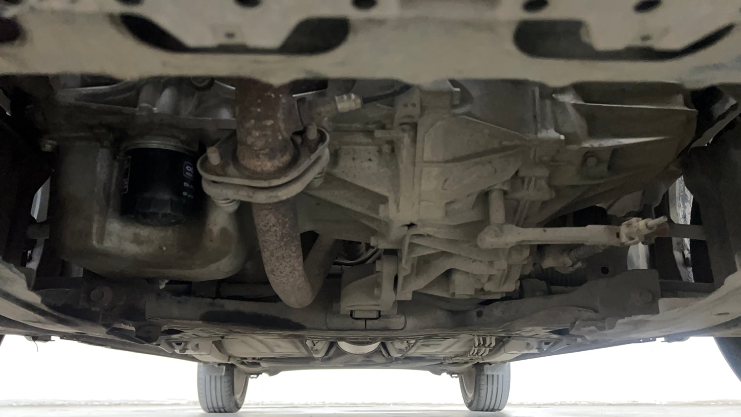 Used 2020 Maruti Suzuki Baleno Zeta Petrol Manual extra FRONT LEFT UNDERBODY VIEW