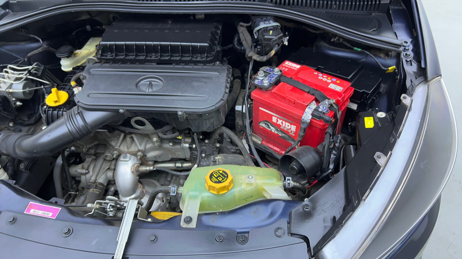 Used 2021 Tata Tigor XMA Petrol Automatic engine ENGINE LEFT SIDE VIEW