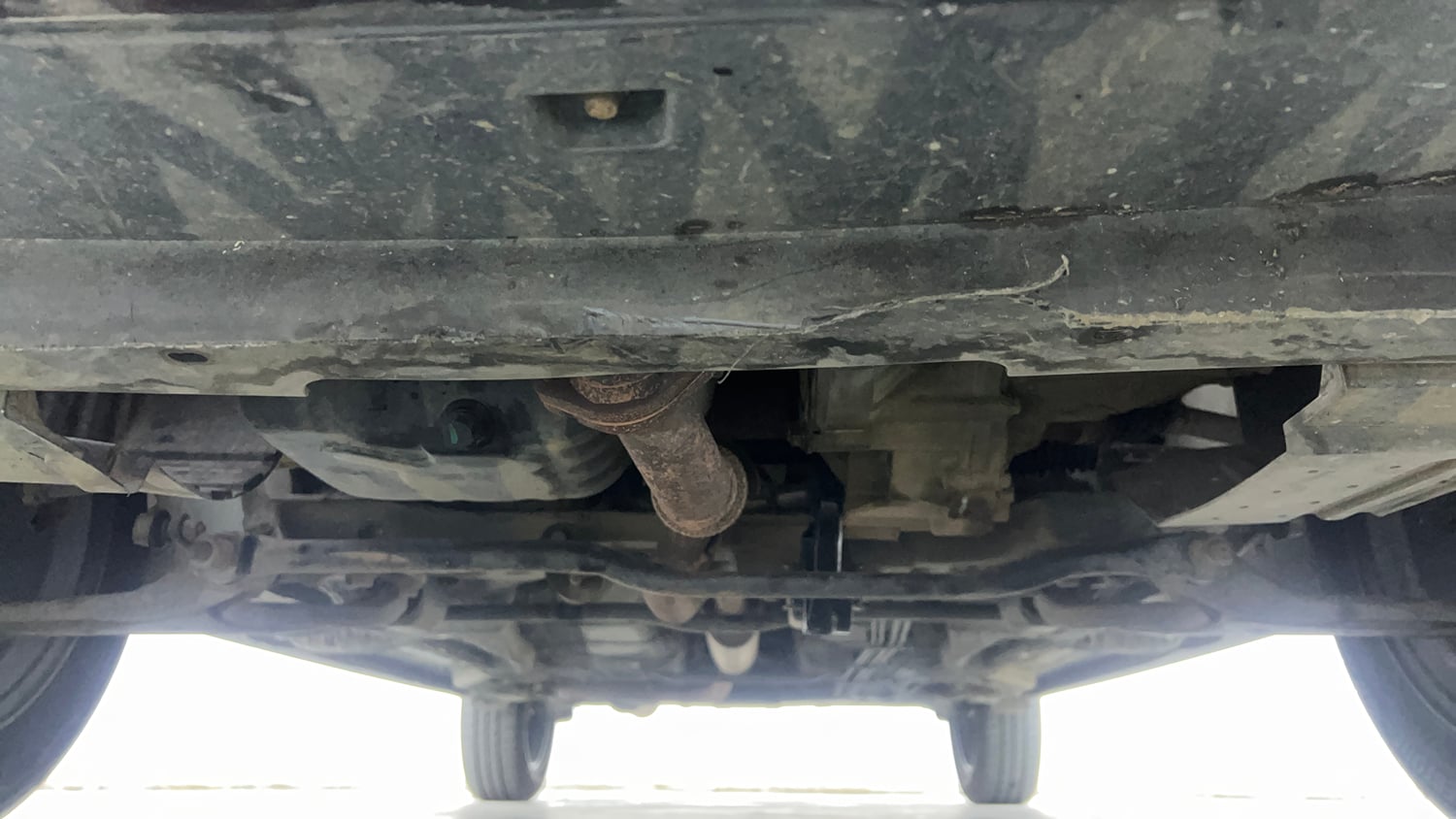 Used 2021 Tata Tigor XZ Plus Petrol Manual extra FRONT LEFT UNDERBODY VIEW