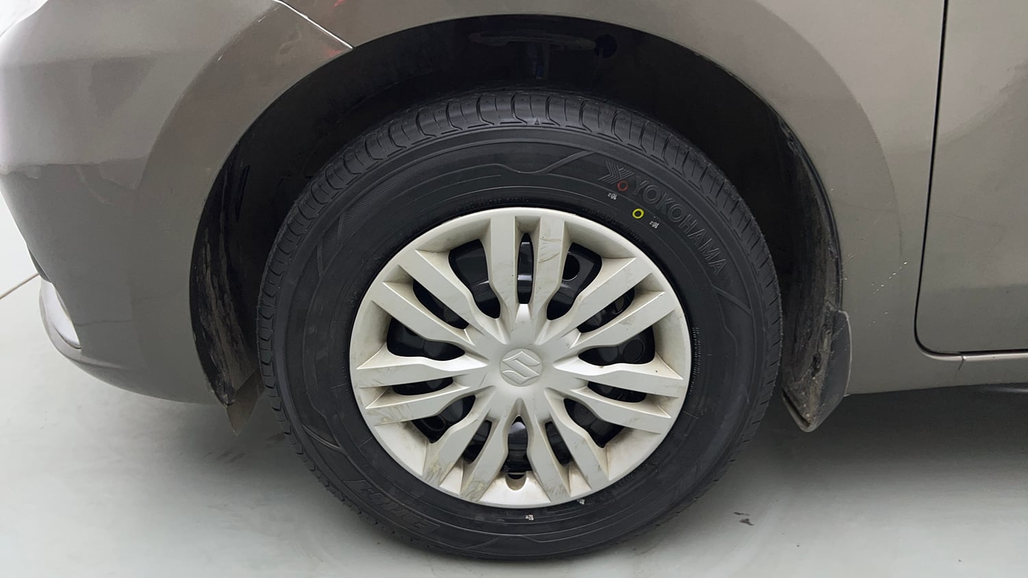 Used 2022 Maruti Suzuki Dzire VXi Petrol Manual tyres LEFT FRONT TYRE RIM VIEW