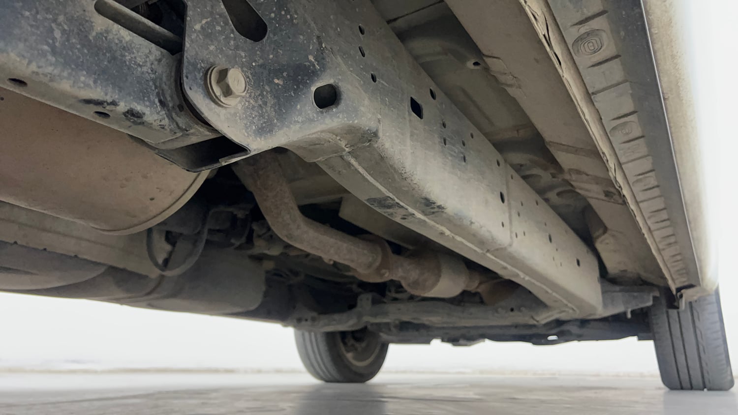 Used 2023 Toyota Innova Crysta ZX 2.7 AT 7 STR Petrol Automatic extra REAR RIGHT UNDERBODY VIEW