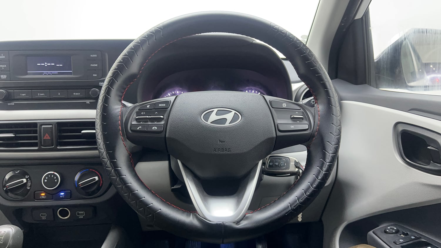 Used 2024 Hyundai Grand i10 Nios Magna 1.2 Kappa Petrol+CNG (Outside Fitted) Cng Manual interior STEERING VIEW