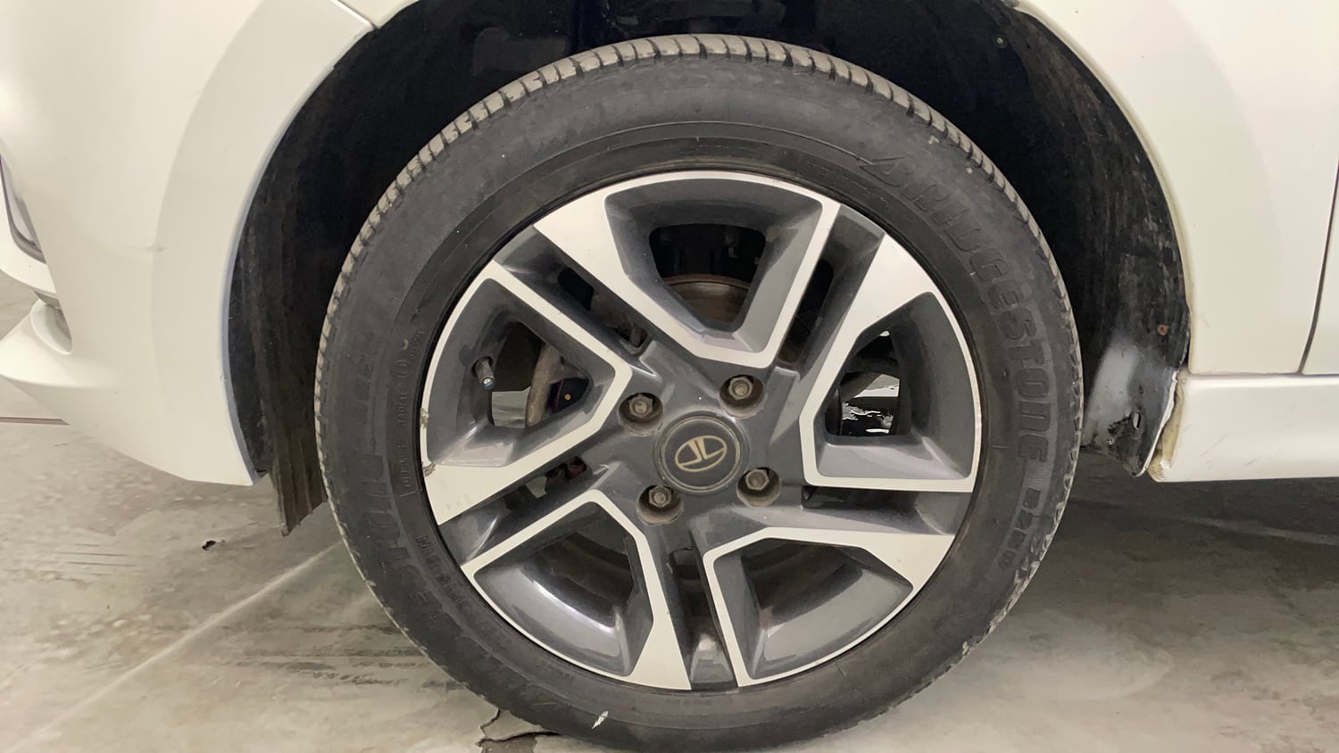 Used 2023 Tata Tiago XZ Plus Petrol Manual tyres LEFT FRONT TYRE RIM VIEW