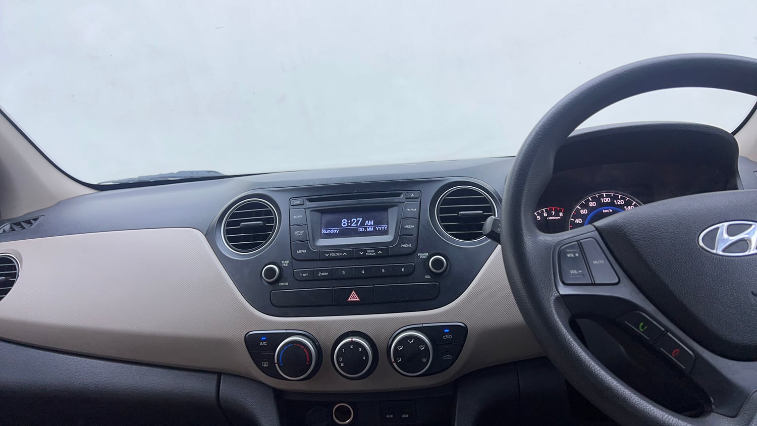Used 2015 Hyundai Grand i10 Sportz 1.2 Kappa VTVT Petrol Manual interior MUSIC SYSTEM & AC CONTROL VIEW