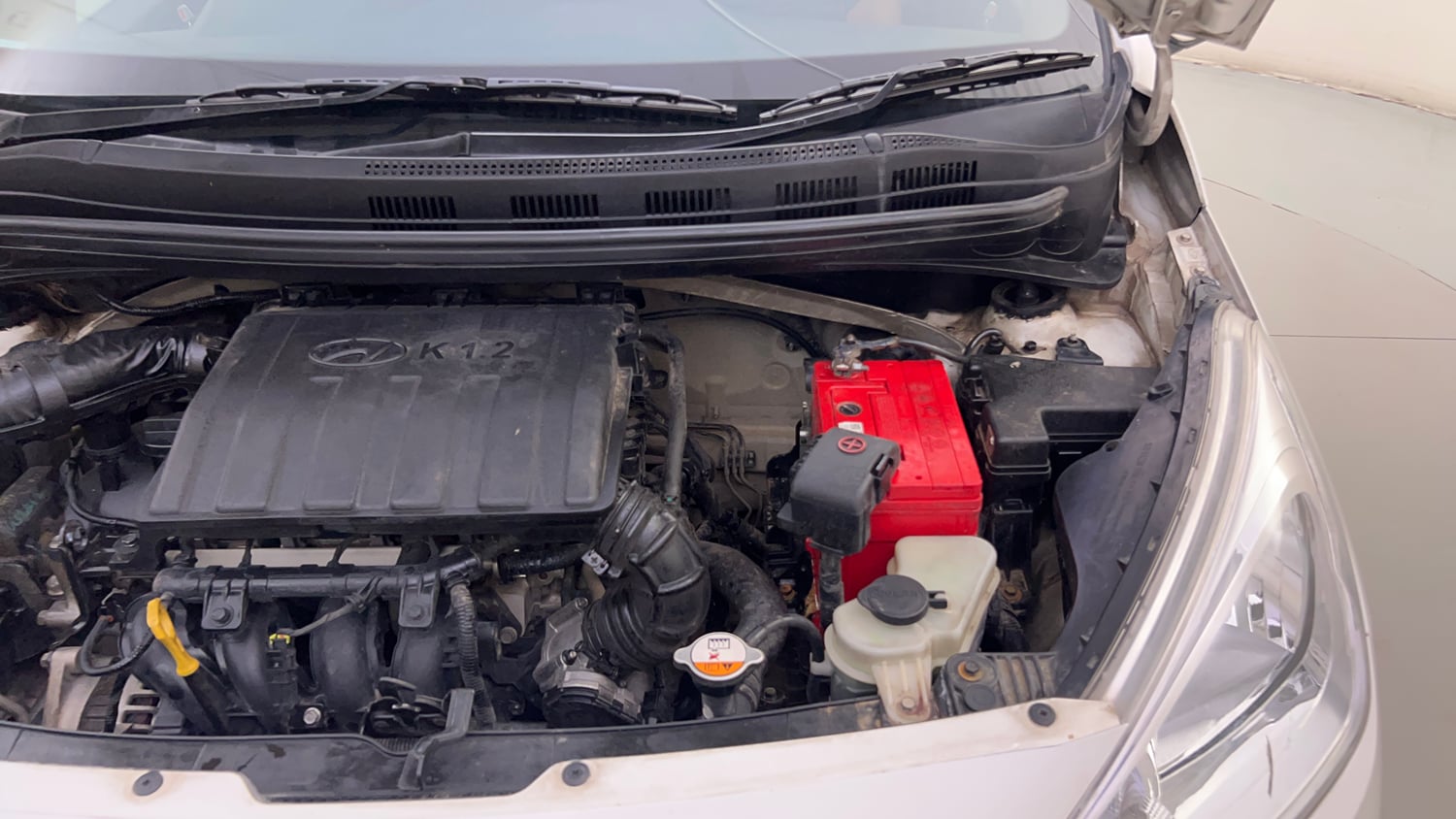 Used 2014 Hyundai Grand i10 Sportz 1.2 Kappa VTVT Petrol Manual engine ENGINE LEFT SIDE HINGE & APRON VIEW