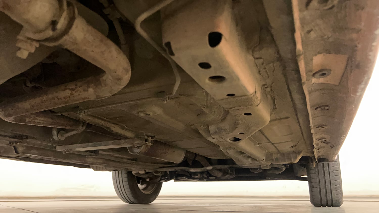 Used 2016 Tata Tiago Revotron XZ Petrol Manual extra REAR RIGHT UNDERBODY VIEW