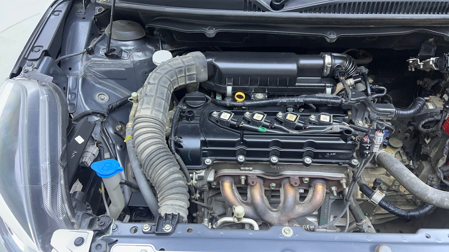 Used 2021 Maruti Suzuki Baleno Zeta Petrol Manual engine ENGINE RIGHT SIDE VIEW