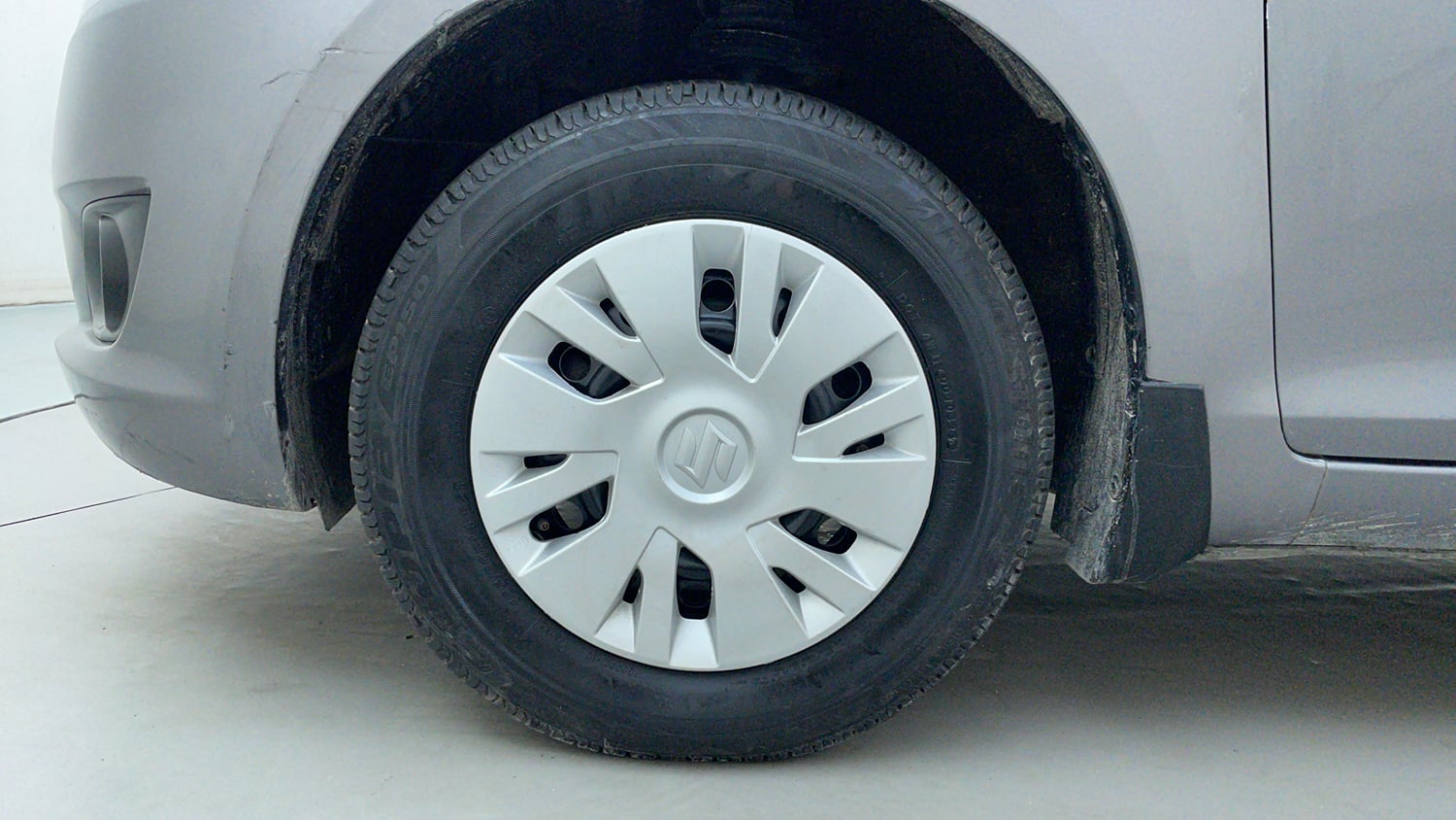 Used 2012 Maruti Suzuki Swift VXi Petrol Manual tyres LEFT FRONT TYRE RIM VIEW