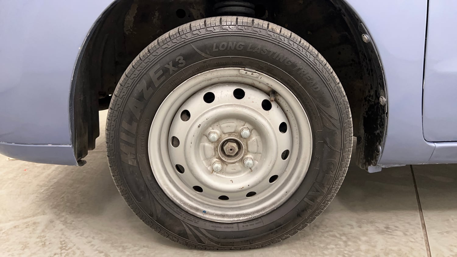 Used 2012 Maruti Suzuki Wagon R LXi Petrol Manual tyres LEFT FRONT TYRE RIM VIEW