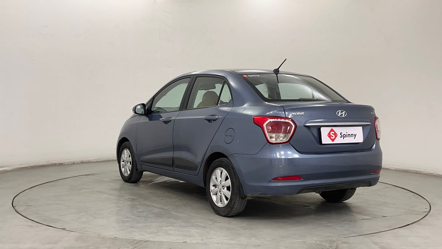 Used 2015 Hyundai Xcent SX 1.2 Petrol Manual exterior LEFT REAR CORNER VIEW