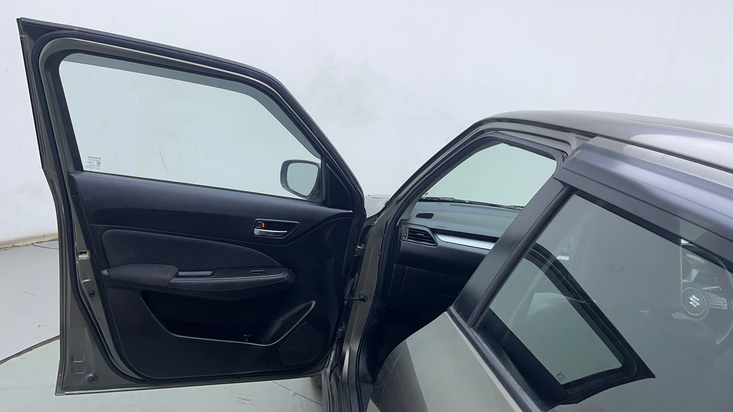 Used 2021 Maruti Suzuki Swift VXi Petrol Manual interior LEFT FRONT DOOR OPEN VIEW