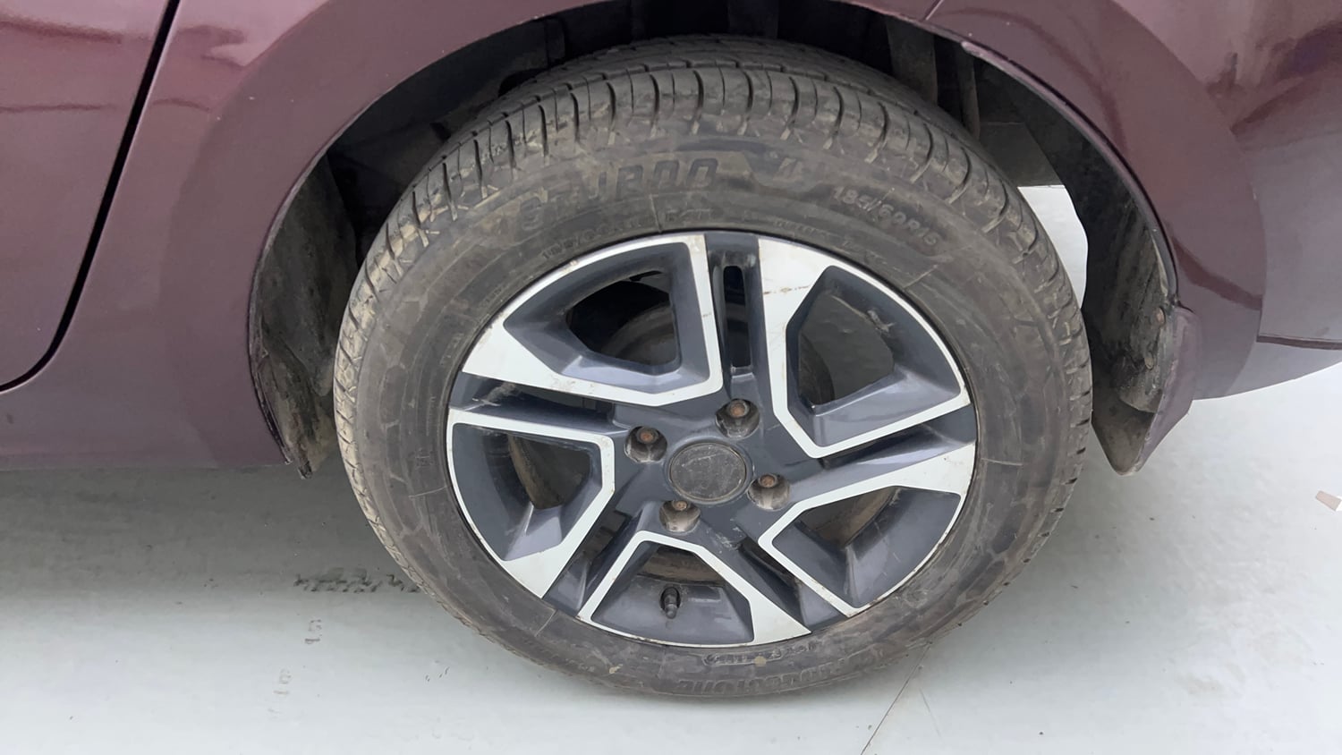 Used 2021 Tata Tigor XZ Plus Petrol Manual tyres LEFT REAR TYRE RIM VIEW