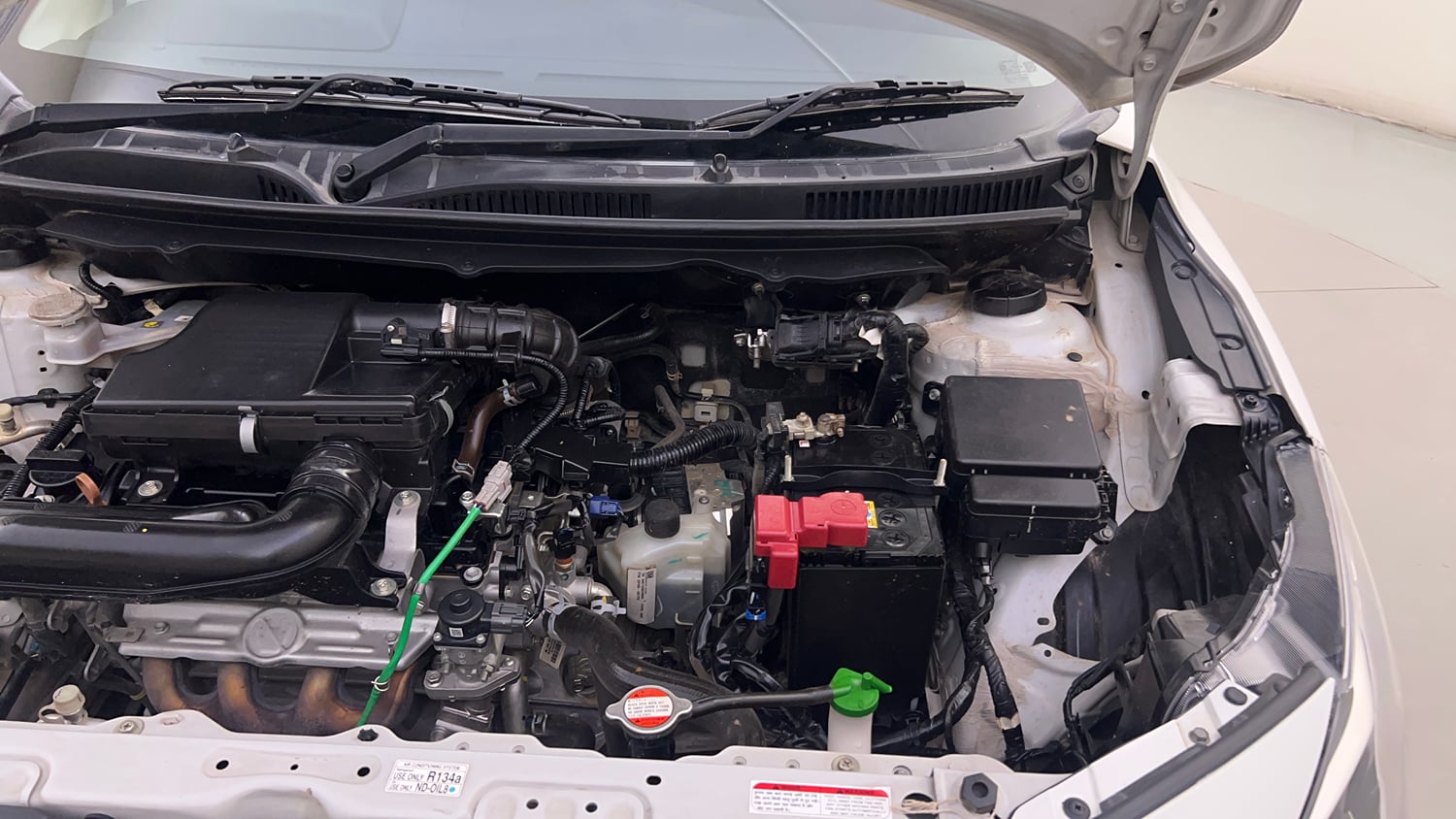 Used 2023 Maruti Suzuki Baleno Alpha AGS Petrol Automatic engine ENGINE LEFT SIDE HINGE & APRON VIEW