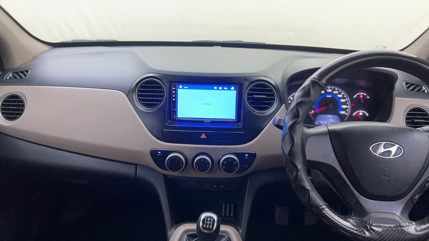Used 2014 Hyundai Grand i10 Sportz 1.2 Kappa VTVT Petrol Manual interior MUSIC SYSTEM & AC CONTROL VIEW