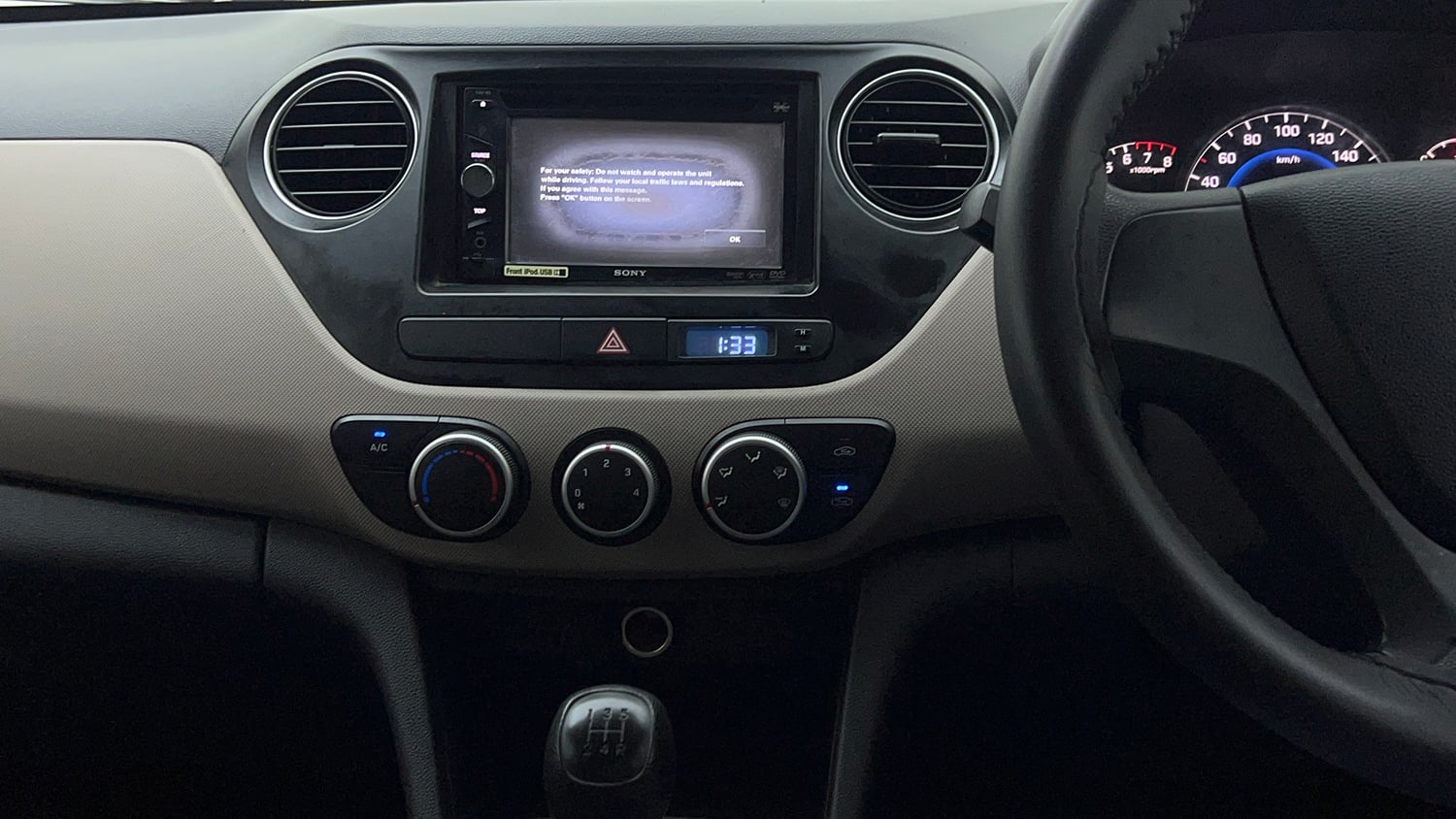 Used 2013 Hyundai Grand i10 Magna 1.2 Kappa VTVT Petrol Manual interior MUSIC SYSTEM & AC CONTROL VIEW