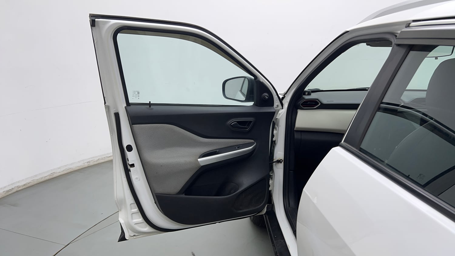 Used 2022 Nissan Magnite XE Petrol Manual interior LEFT FRONT DOOR OPEN VIEW