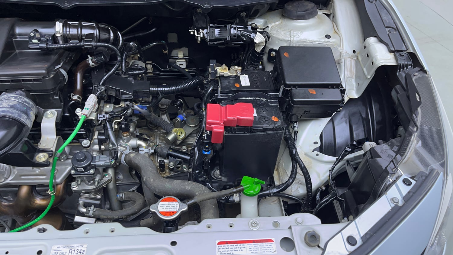 Used 2024 Toyota Glanza V Petrol Manual engine ENGINE LEFT SIDE VIEW