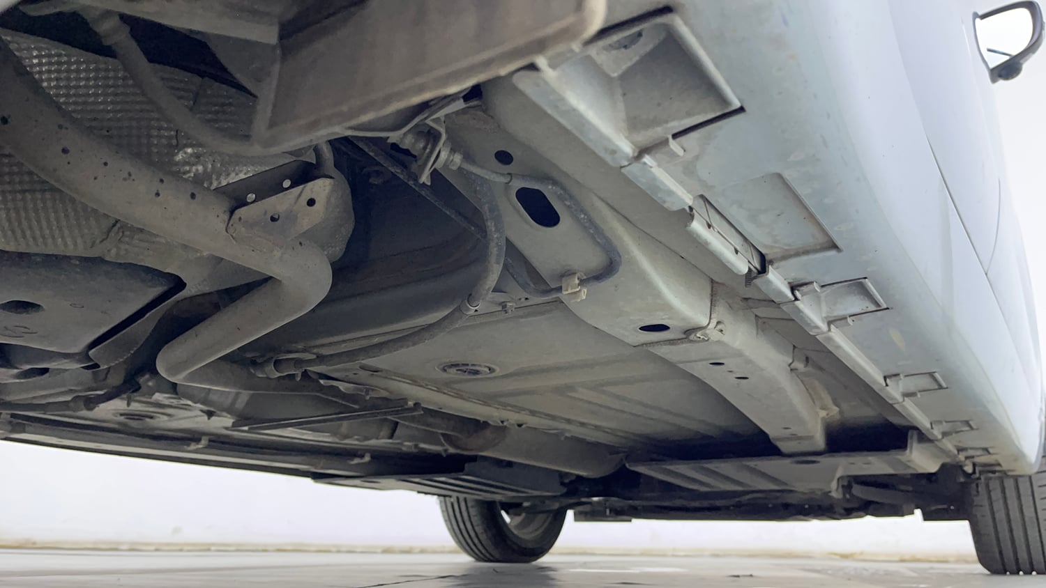 Used 2024 Toyota Glanza V Petrol Manual extra REAR RIGHT UNDERBODY VIEW