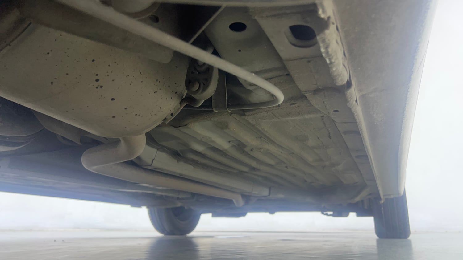 Used 2024 Honda Amaze S 1.2 Petrol CVT Petrol Automatic extra REAR RIGHT UNDERBODY VIEW
