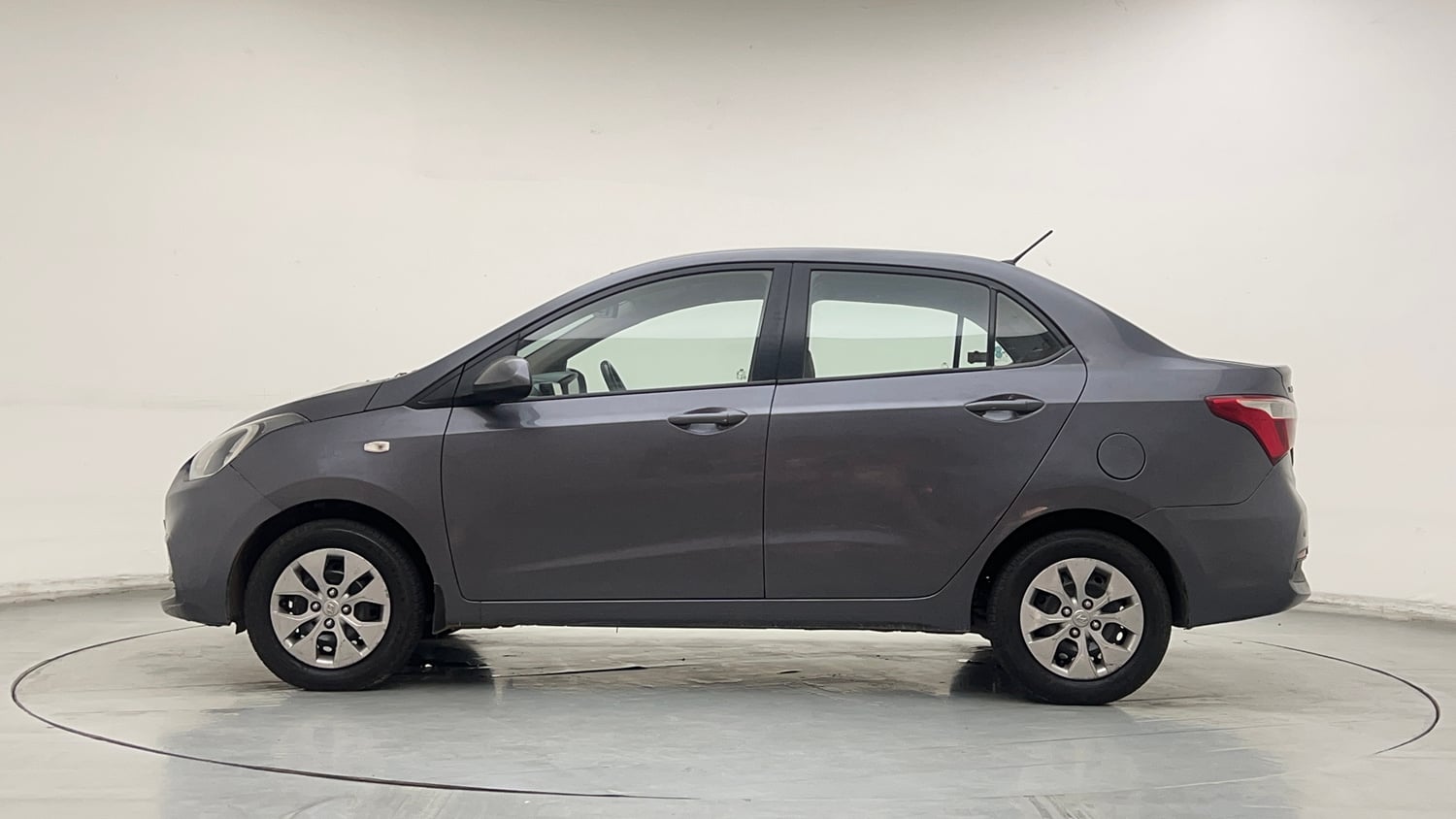 Used 2018 Hyundai Xcent E+ CNG (Outside Fitted) Cng Manual exterior LEFT SIDE VIEW