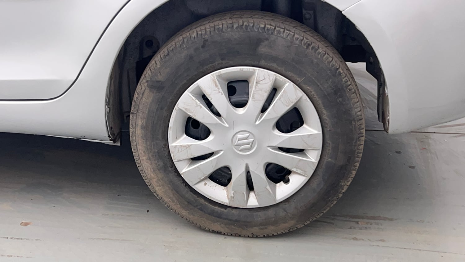 Used 2012 Maruti Suzuki Swift Dzire VXI Petrol Manual tyres LEFT REAR TYRE RIM VIEW