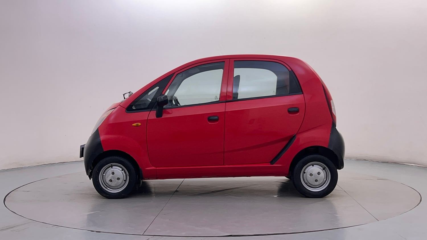 Used 2013 Tata Nano CX Petrol Manual exterior LEFT SIDE VIEW