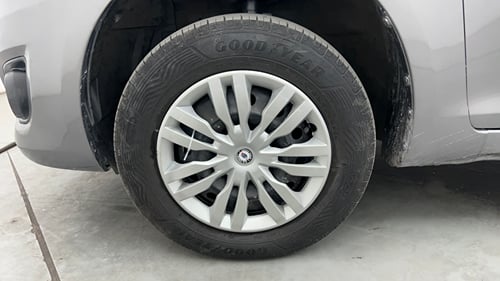 Used 2013 Maruti Suzuki Swift Dzire VXI Petrol Manual tyres LEFT FRONT TYRE RIM VIEW