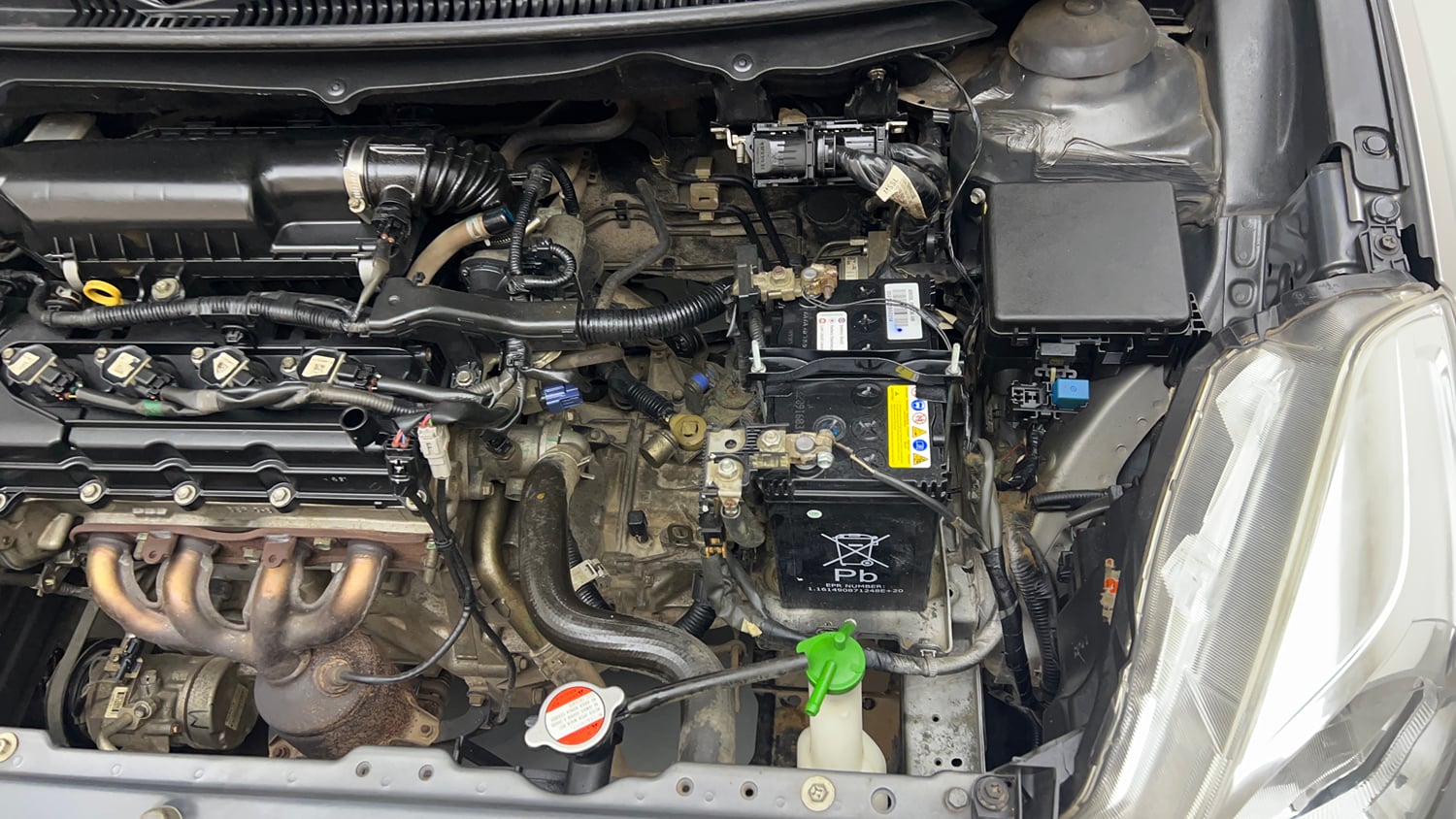 Used 2021 Maruti Suzuki Baleno Sigma Petrol Manual engine ENGINE LEFT SIDE VIEW