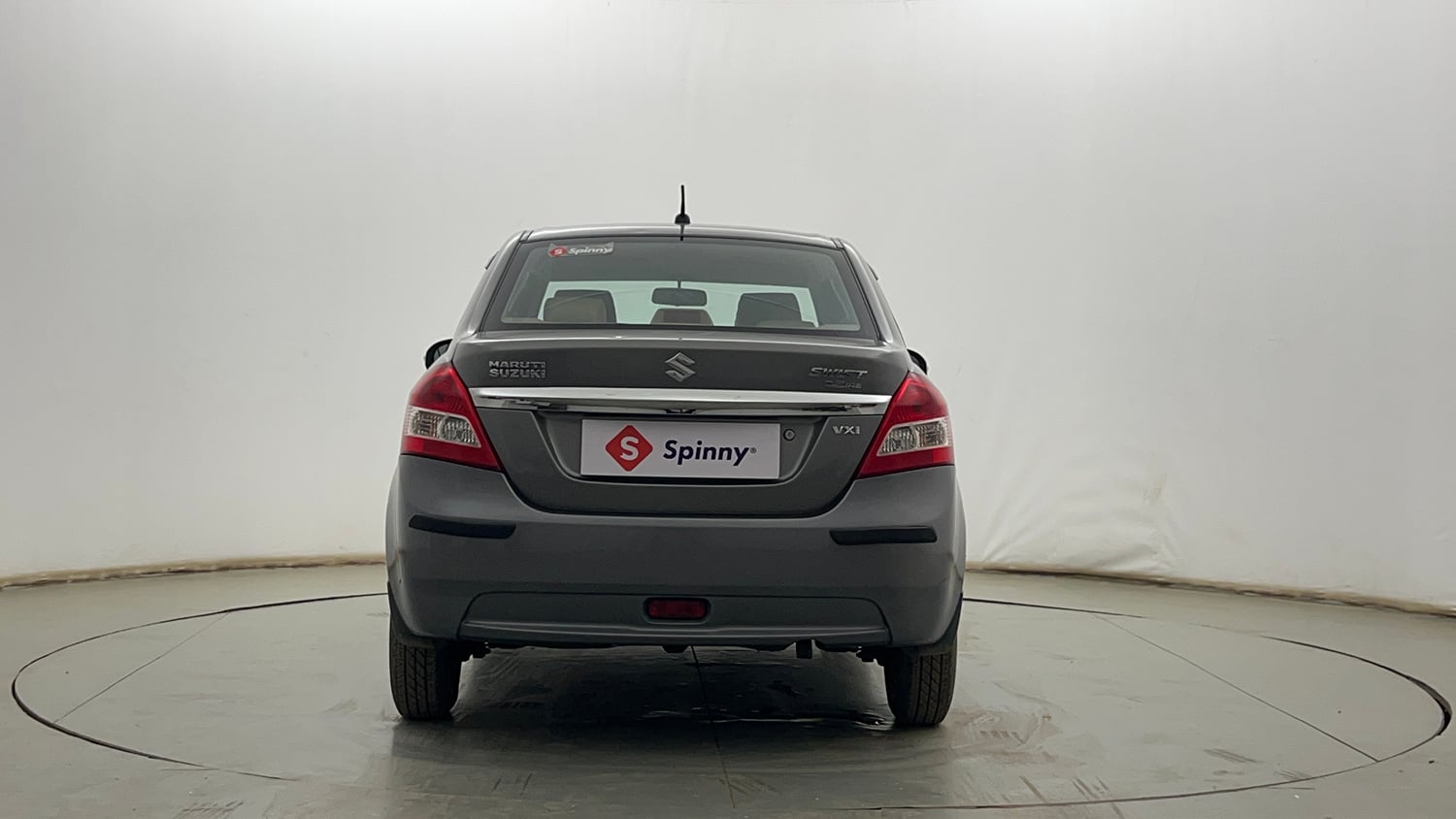 Used 2014 Maruti Suzuki Swift Dzire VXI Petrol Manual exterior BACK VIEW