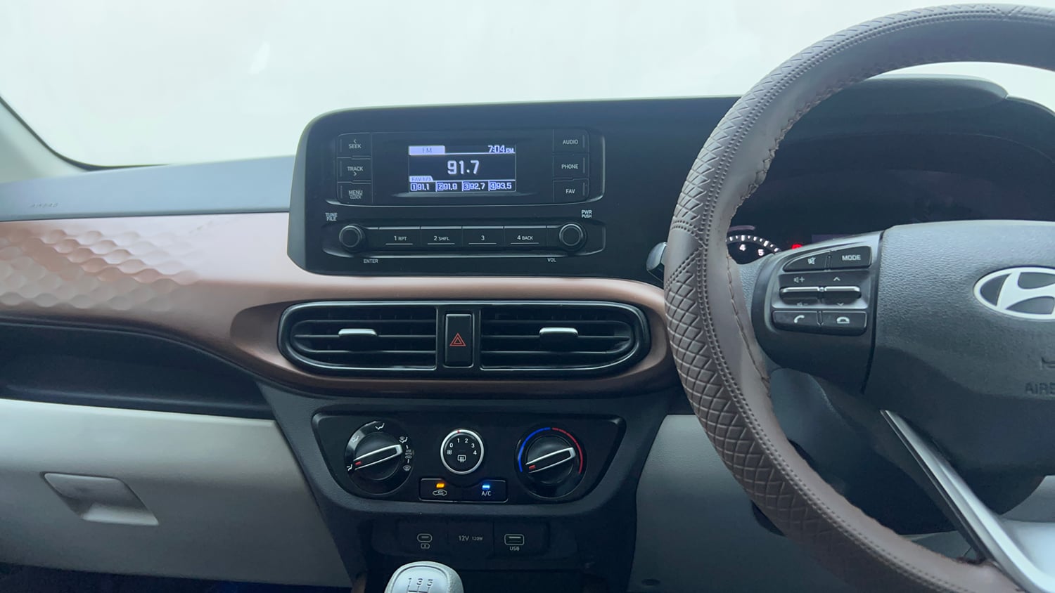 Used 2025 Hyundai Aura S 1.2 Petrol Petrol Manual interior MUSIC SYSTEM & AC CONTROL VIEW