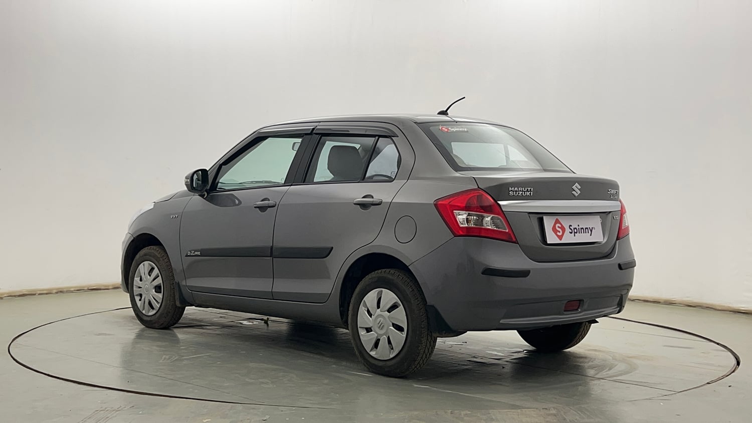 Used 2014 Maruti Suzuki Swift Dzire VXI Petrol Manual exterior LEFT REAR CORNER VIEW