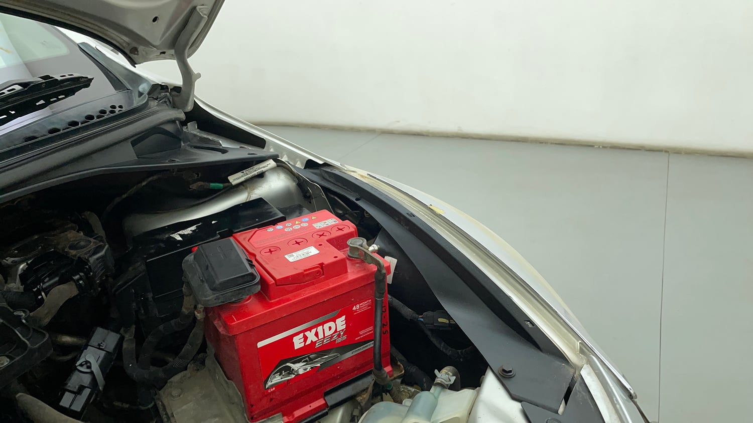 Used 2018 Tata Tiago Revotron XZ Petrol Manual engine ENGINE LEFT SIDE HINGE & APRON VIEW