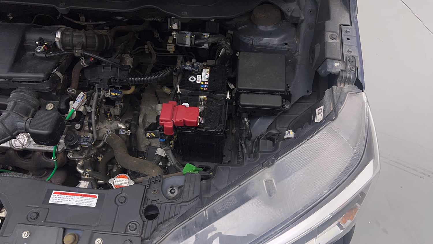 Used 2022 Maruti Suzuki XL6 Alpha Plus AT Petrol Petrol Automatic engine ENGINE LEFT SIDE VIEW