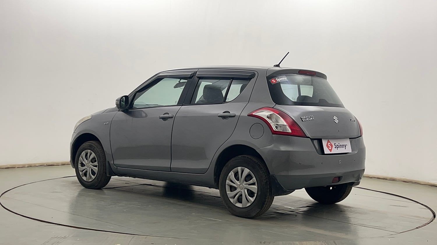 Used 2015 Maruti Suzuki Swift VXi Petrol Manual exterior LEFT REAR CORNER VIEW