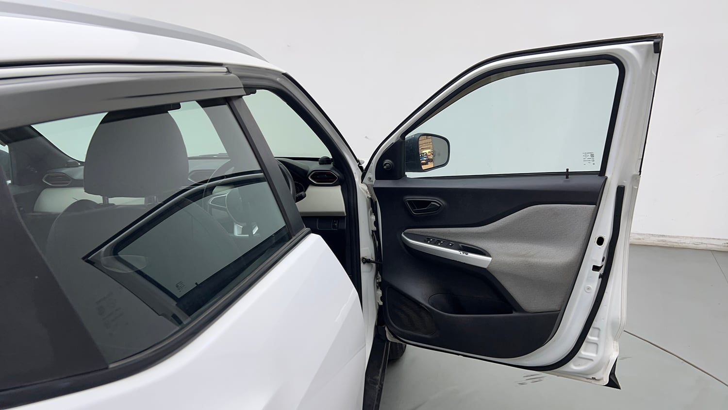 Used 2022 Nissan Magnite XE Petrol Manual interior RIGHT FRONT DOOR OPEN VIEW