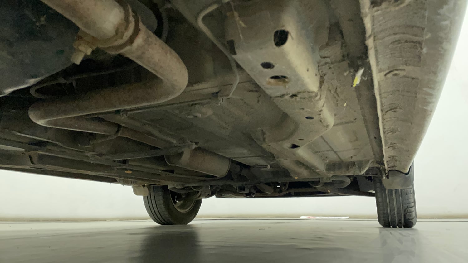 Used 2018 Tata Tiago Revotron XZ Petrol Manual extra REAR RIGHT UNDERBODY VIEW