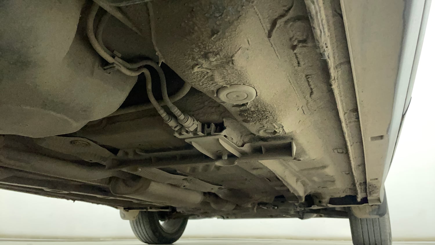 Used 2022 Volkswagen Taigun Topline 1.0 TSI MT Petrol Manual extra REAR RIGHT UNDERBODY VIEW