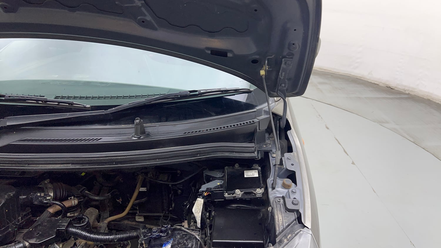 Used 2022 Maruti Suzuki Wagon R VXI 1.0 Petrol Manual engine ENGINE LEFT SIDE HINGE & APRON VIEW