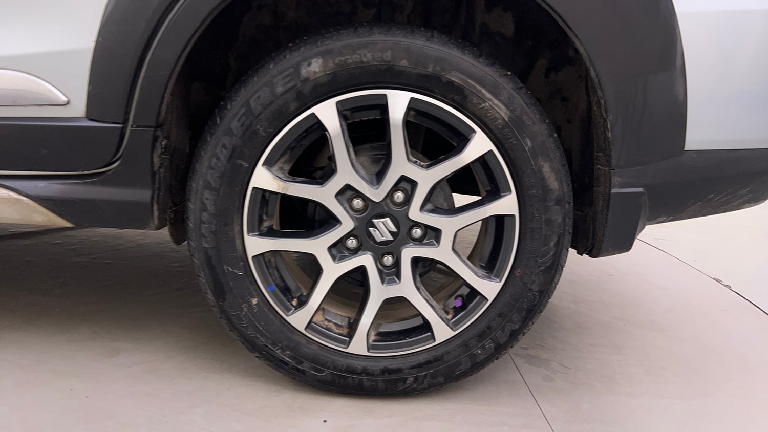 Used 2023 Maruti Suzuki XL6 Alpha MT Petrol Petrol Manual tyres LEFT REAR TYRE RIM VIEW