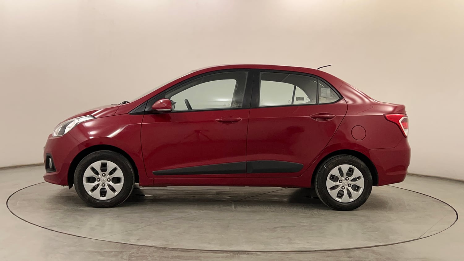Used 2014 Hyundai Xcent S 1.2 Petrol Manual exterior LEFT SIDE VIEW