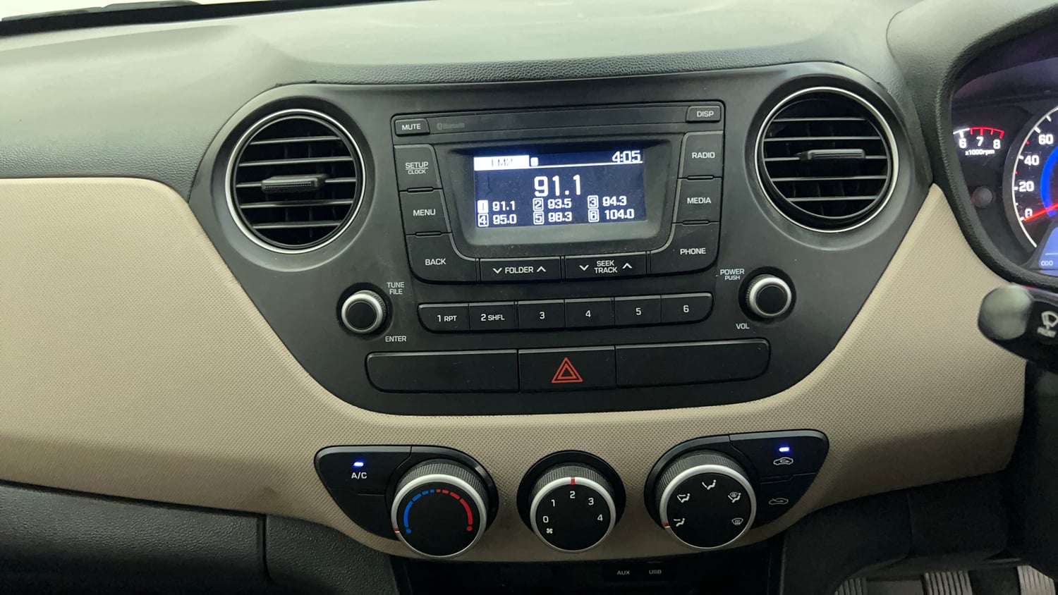 Used 2019 Hyundai Grand i10 Magna 1.2 Kappa VTVT Petrol Manual interior MUSIC SYSTEM & AC CONTROL VIEW