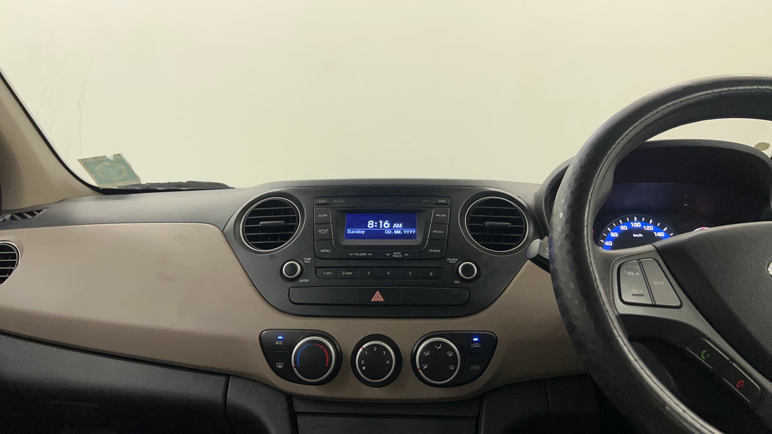 Used 2014 Hyundai Xcent S 1.2 Petrol Manual interior MUSIC SYSTEM & AC CONTROL VIEW