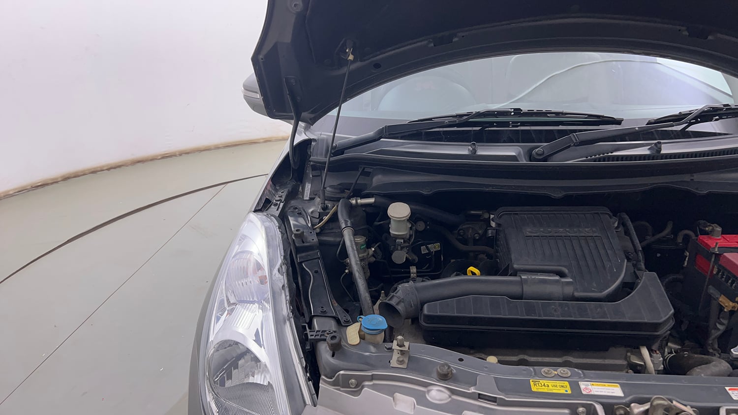 Used 2014 Maruti Suzuki Swift Dzire VXI Petrol Manual engine ENGINE RIGHT SIDE HINGE & APRON VIEW