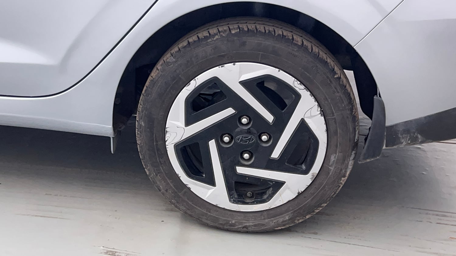 Used 2023 Hyundai Aura S 1.2 Petrol Petrol Manual tyres LEFT REAR TYRE RIM VIEW
