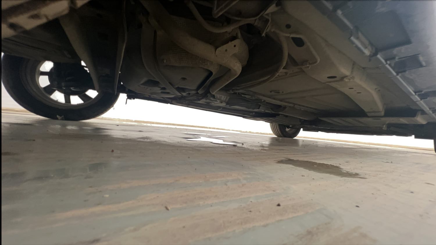Used 2025 Toyota Glanza V AMT Petrol Automatic extra REAR RIGHT UNDERBODY VIEW