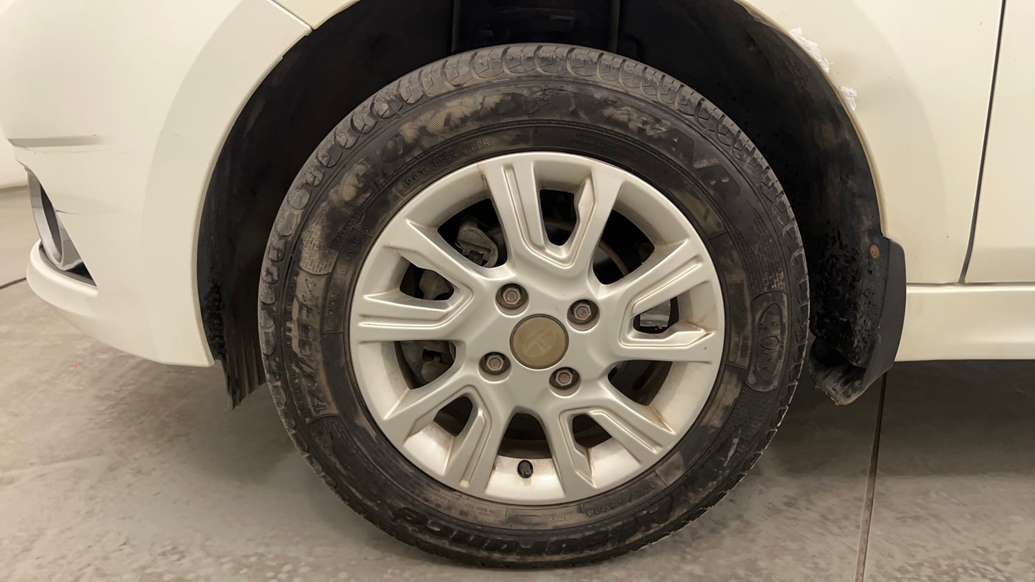 Used 2018 Tata Tiago Revotron XZ Petrol Manual tyres LEFT FRONT TYRE RIM VIEW
